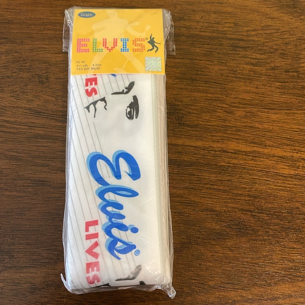 Elvis blanket binding polyester. NWT 4 3/4 yards. 1 unopened/ unused . 1 open